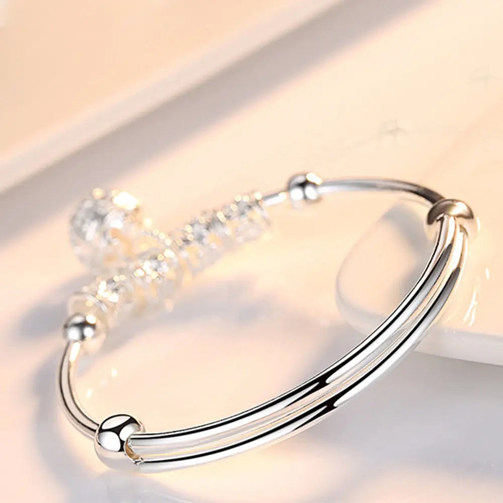 Fine Silver Hollow Bell Ball Bangle – Adjustable Bracelet for Women