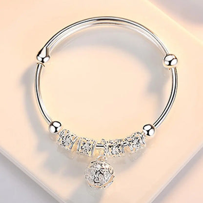 Fine Silver Hollow Bell Ball Bangle – Adjustable Bracelet for Women